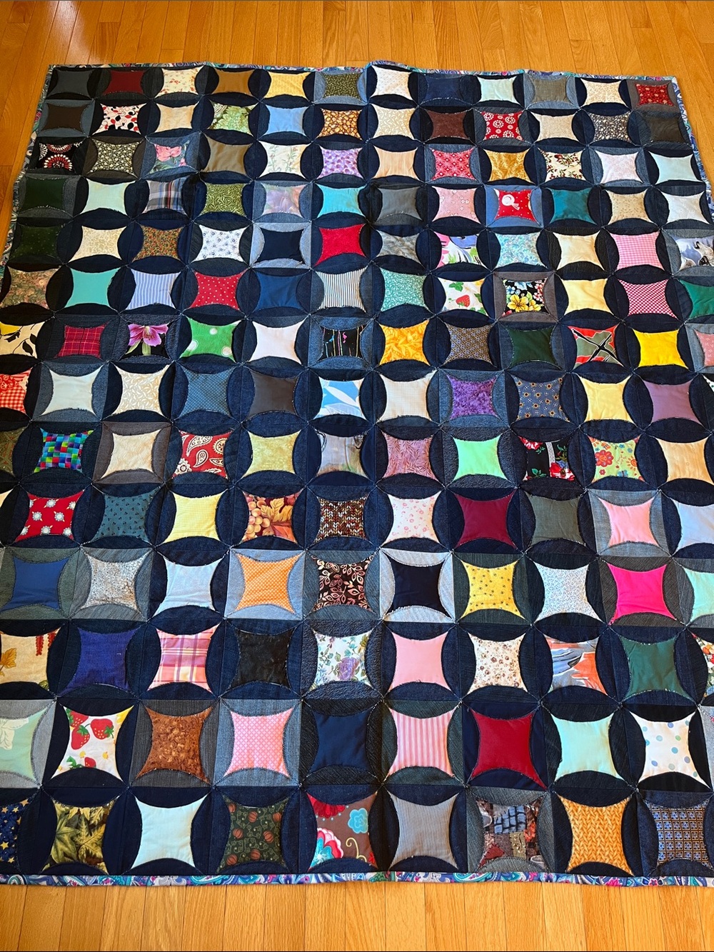Handmade Multicolor Patchwork Cathedral Window Quilt
Denim
Reversible